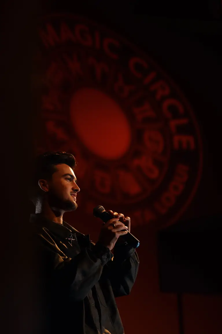 Charlie Hewish performing on stage